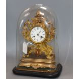 A French bronze mantel clock under dome