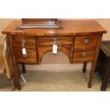 A George III mahogany bowfront sideboard W.113cm