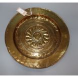 A 17th century Nuremburg embossed brass alms dish diameter 41.5cm