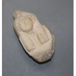 An Egyptian 18th / 19th century limestone head, possiblt from antiquity, length 14cm
