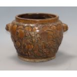 A Chinese brown glazed 'dragon', cockerel and deer' jar, 19th century height 17cm