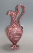 A Venetian swirled pink glass ewer height 33cm