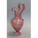 A Venetian swirled pink glass ewer height 33cm