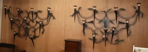 A near pair of Continental painted wrought iron wall light appliques W.198cm