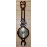 A mahogany wheel barometer by A. Martinelli, 70 Union Street, Borough, line-inlaid with ebony and