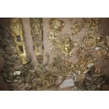 A quantity of ormolu and gilt metal furniture mounts