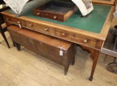 A mahogany partners' desk, fitted six drawers, on tapered legs and spade feet W.167.5cm, D.106cm