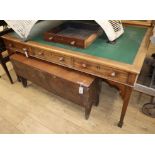 A mahogany partners' desk, fitted six drawers, on tapered legs and spade feet W.167.5cm, D.106cm