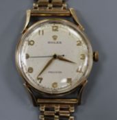 A gentleman's 9ct gold Rolex precision wristwatch, with gilt Arabic numerals, gold handles and blued