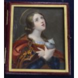 A 19th century oil on ivory miniature of a female saint, 13 x 11cm, leather cased