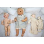 A 1950's Italian clockwork crying doll, a Heubach Koppelsdorf doll and two bisque dolls