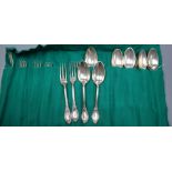 Twelve pairs of late 19th century Dutch silver dessert spoons and forks, J M van Kempen, minimum 0.