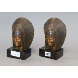 Georges Garreau (1852-1943). A pair of cold painted bronze American Indian bookends, signed height