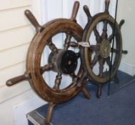 A 19th century brass mounted ship's wheel and a 20th century ship's wheel