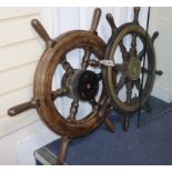 A 19th century brass mounted ship's wheel and a 20th century ship's wheel