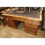 A pine pedestal desk W.150cm