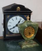 A 19th century cuckoo clock and an onyx timepiece