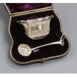 A late Victorian silver sifter, ladle and bowl christening set, in fitted leather case, London 1896