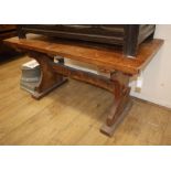 An oak refectory dining table L.137cm