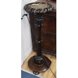 An early Victorian Anglo Indian carved hardwood cue stand H.97cm