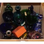 A collection of mixed coloured glassware