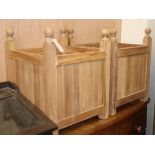 A pair of teak square garden planters W.44cm