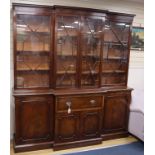 A Georgian style mahogany breakfront bookcase fitted four astragal-glazed doors H.228.5cm, W.214cm