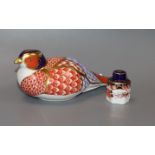 A Crown Derby pheasant paperweight and miniature lidded jar