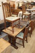 An oak refectory table and four 1920's oak dining chairs