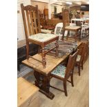 An oak refectory table and four 1920's oak dining chairs
