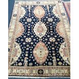 A Caucasian blue ground rug 220 x 149cm