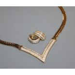A Christian Dior chevron gilt metal and paste pendant necklace and matching earrings