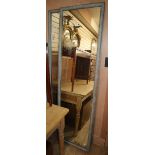 A pair of grey painted wall mirrors H.194cm, W.55cm