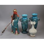 A Chinese celadon vase, a Chinese figure and two turquoise 'dragon' vases
