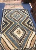 A flat weave Moroccan rug and a Kilim rug (2) 230 x 148cm and 120 x 95cm