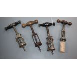 Four German coiled spring steel corkscrews, late 19th, early 20th century two with split barrels (