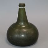 A 17th century Dutch onion-shaped glass wine bottle height 17cm