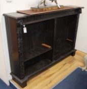 A 19th century carved oak open bookcase W.153cm