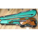 A cased two-piece back violin