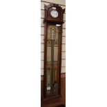 A Victorian Admiral Fitzroy's barometer, in carved arched walnut case with printed paper scales
