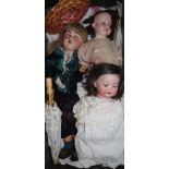 A Heubach 444 open mounted, pierced ears, jointed bisque headed doll in original costume and an