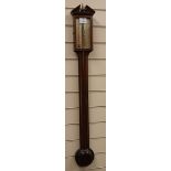 A Georgian style stick barometer by O. Comitti & Son, London, in inlaid mahogany case with