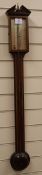 A Georgian style stick barometer by O. Comitti & Son, London, in inlaid mahogany case with