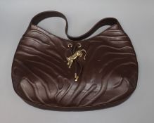 A Cartier Panthere textured brown leather shoulder bag, with signature gold-toned panther decoration