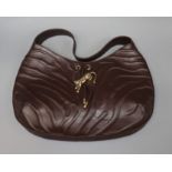 A Cartier Panthere textured brown leather shoulder bag, with signature gold-toned panther decoration