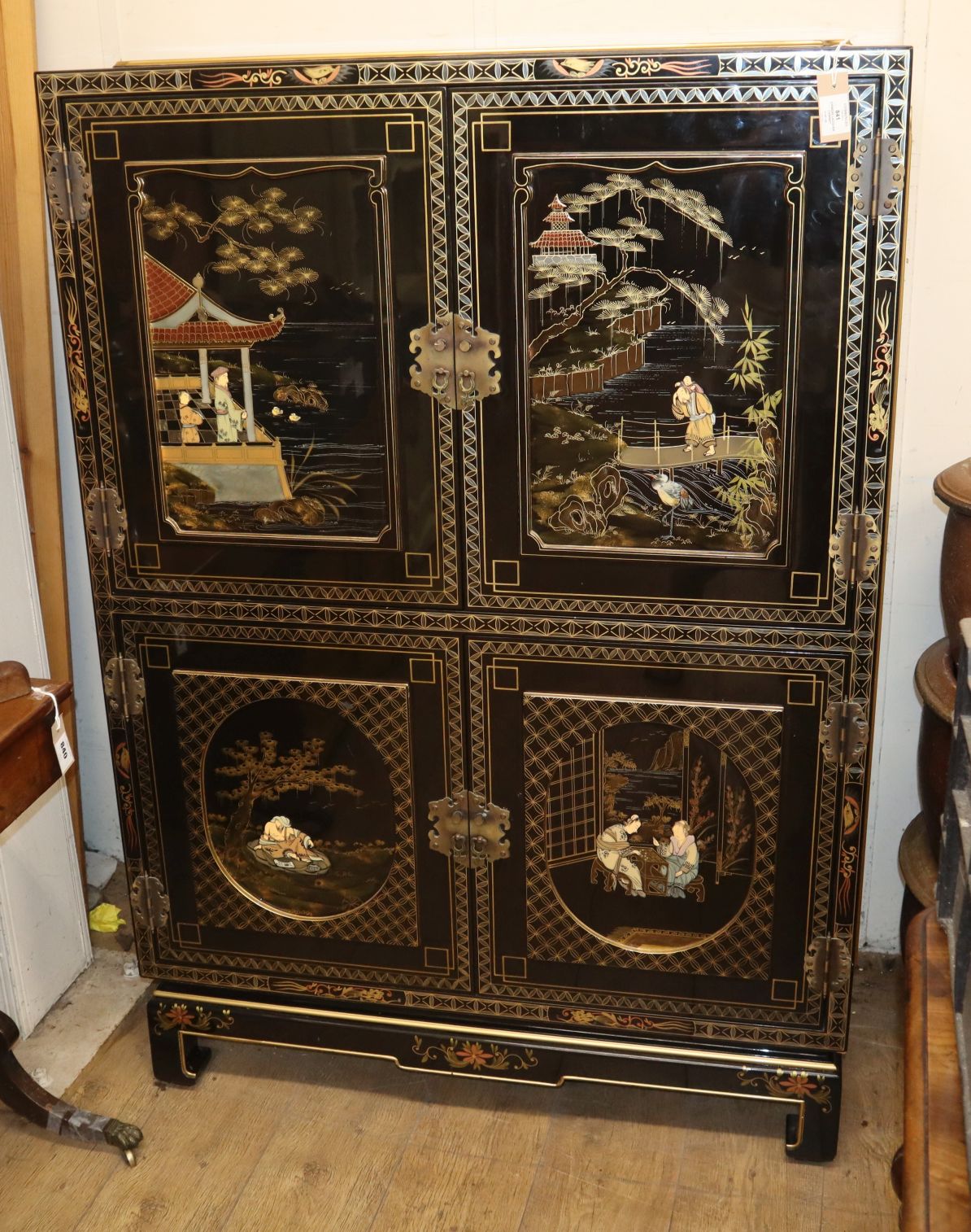 A Chinese lacquer cabinet W.100cm