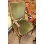 A Louis XVI style walnut framed fauteuil