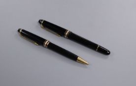 A Montblanc Meisterstuck fountain pen and ballpoint pen set fountain 14cm. ballpoint 13.75cm.