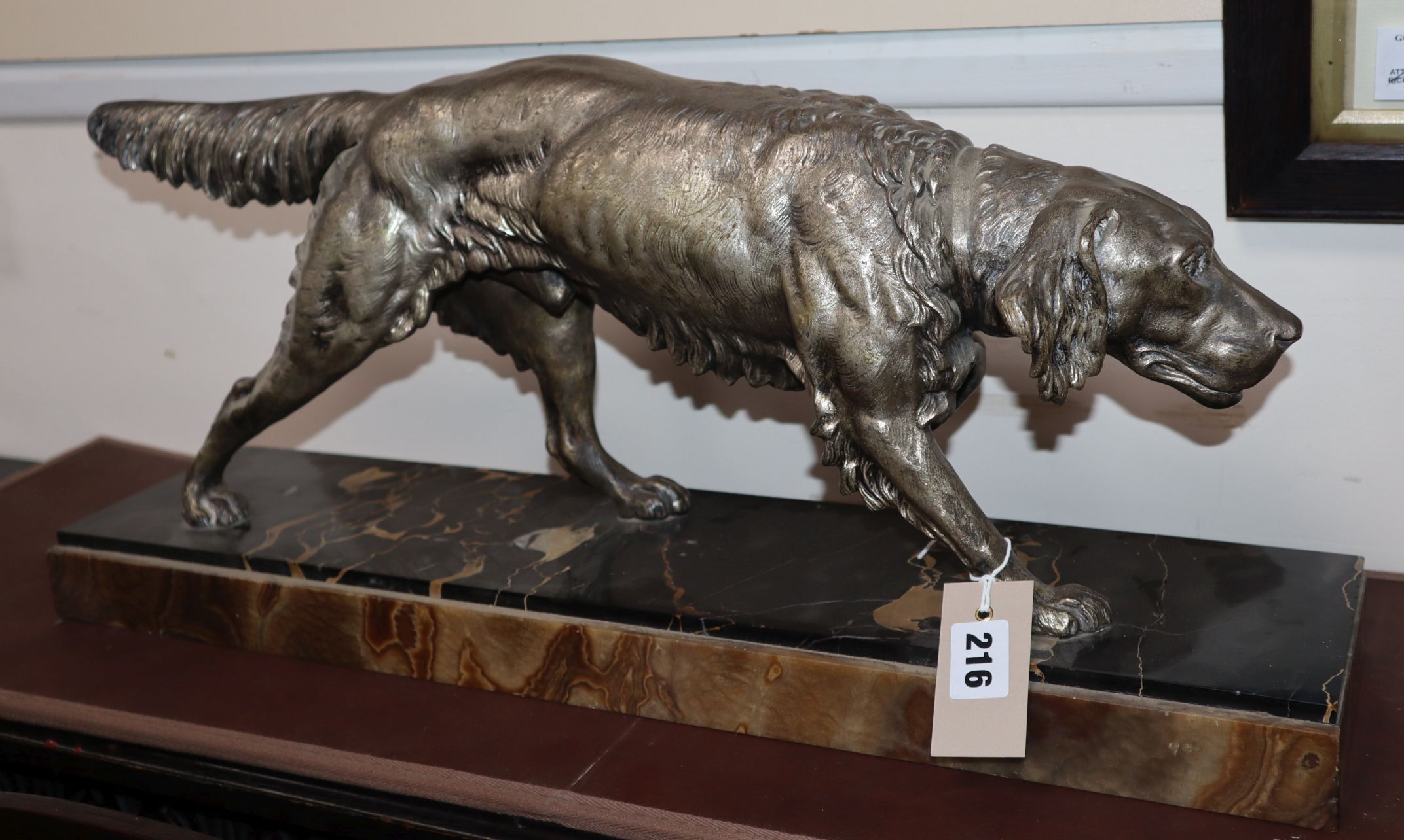 Clovis Mason. An early 20th century white metal model of a pointer, on a marble onyx base, signed