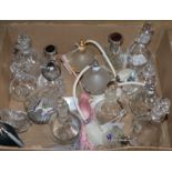 Six glass oil bottles and stoppers, seven decoratively-mounted cut and plain glass perfume bottles